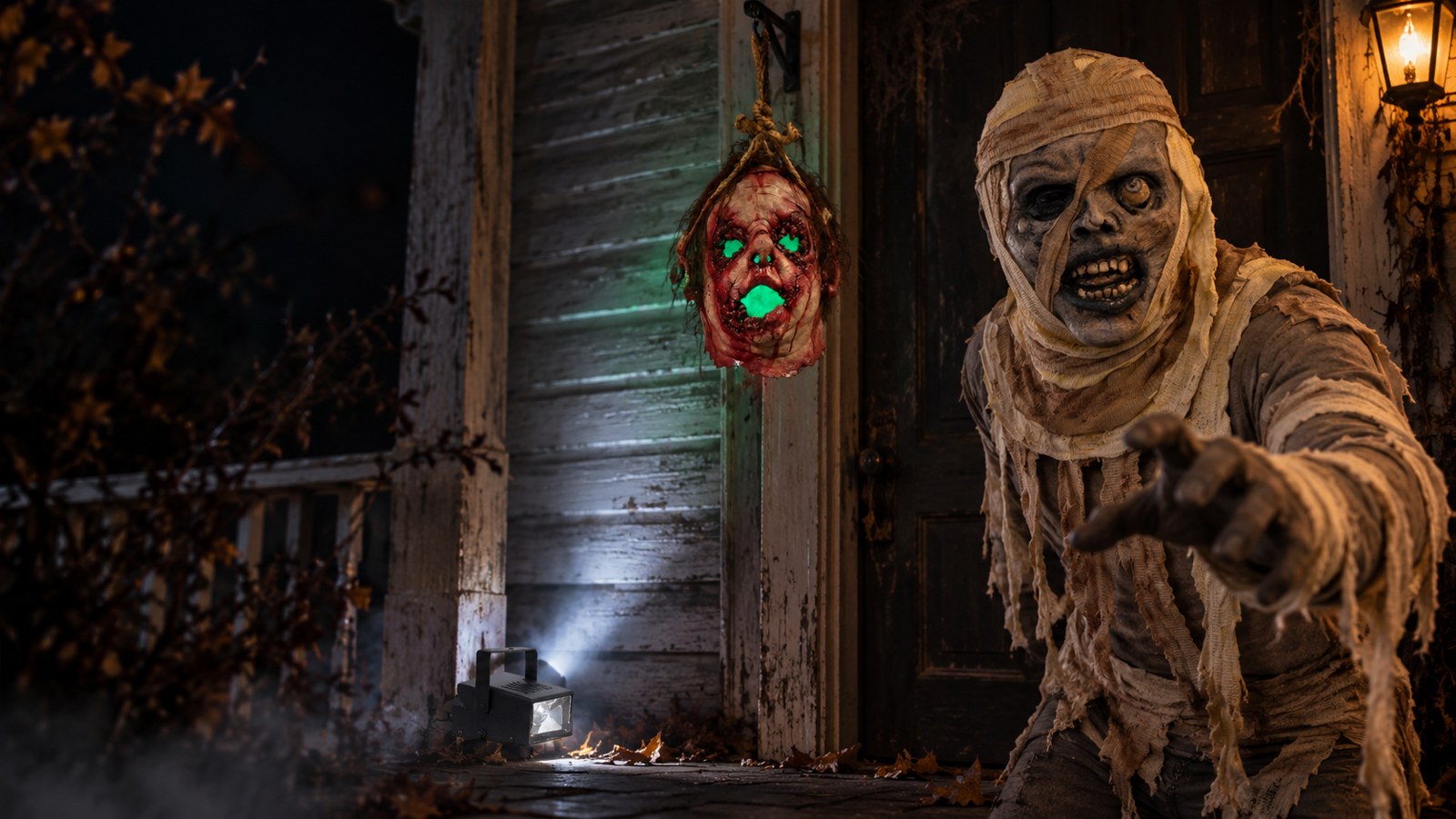 Mummy mask and glowing jack prop.